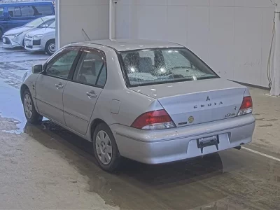 Mitsubishi LANCER  с аукциона в Японии