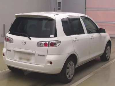 Mazda DEMIO  с аукциона в Японии