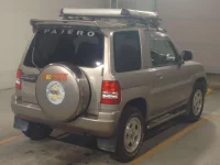 Mitsubishi PAJERO IO лот № 9049 оценка 3  с аукциона в Японии 1