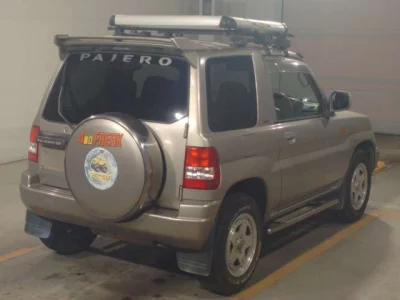 Mitsubishi PAJERO IO  с аукциона в Японии