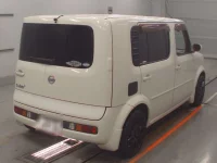 Nissan CUBECUBIC лот № 10093 оценка 3.5  с аукциона в Японии 1