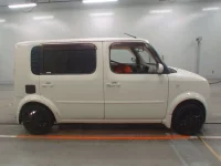 Nissan CUBECUBIC лот № 10093 оценка 3.5  с аукциона в Японии 2