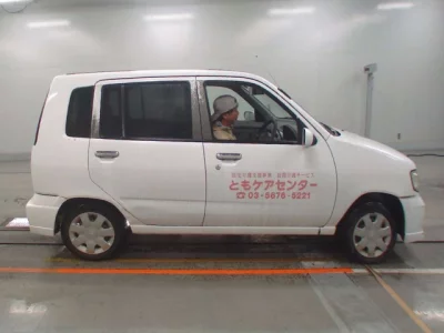 Nissan CUBE  с аукциона в Японии