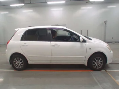 Toyota COROLLA RUNX  с аукциона в Японии