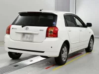 Toyota COROLLA RUNX лот № 10349 оценка RA  с аукциона в Японии 1