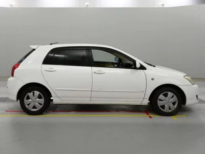 Toyota COROLLA RUNX  с аукциона в Японии