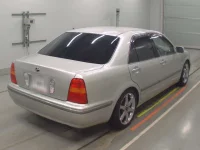 Toyota PROGRES лот № 10353 оценка 3.5  с аукциона в Японии 1