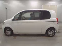 Toyota PORTE лот № 10435 оценка 4  с аукциона в Японии 3