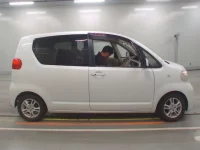 Toyota PORTE лот № 31329 оценка 3.5  с аукциона в Японии 2