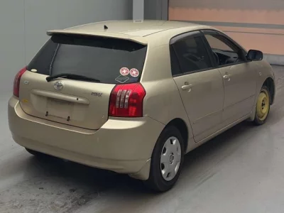 Toyota COROLLA RUNX  с аукциона в Японии