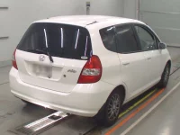 Honda FIT лот № 10054 оценка 3.5  с аукциона в Японии 1