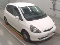 Honda FIT лот № 10054 оценка 3.5  с аукциона в Японии 4