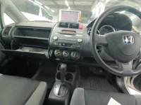 Honda FIT лот № 10054 оценка 3.5  с аукциона в Японии 8