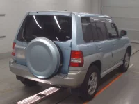Mitsubishi PAJERO IO лот № 30547 оценка 3.5  с аукциона в Японии 1