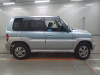 Mitsubishi PAJERO IO лот № 30547 оценка 3.5  с аукциона в Японии 2