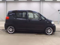 Toyota PORTE лот № 5599 оценка 3.5  с аукциона в Японии 2