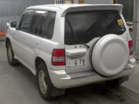 Mitsubishi PAJERO IO лот № 3091 оценка 3.5  с аукциона в Японии 1