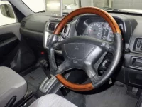 Mitsubishi PAJERO IO лот № 3091 оценка 3.5  с аукциона в Японии 2