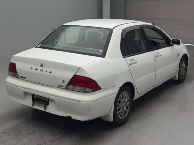 Mitsubishi LANCER  с аукциона в Японии