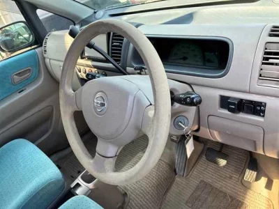 Nissan MOCO  с аукциона в Японии