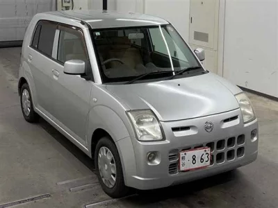 Nissan PINO  с аукциона в Японии