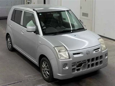 Nissan PINO  с аукциона в Японии