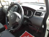 Nissan TIIDA лот № 90280 оценка 3.5  с аукциона в Японии 8