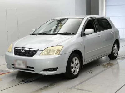 Toyota COROLLA RUNX  с аукциона в Японии