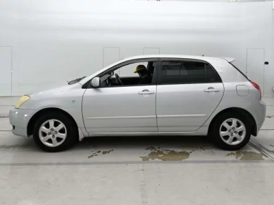 Toyota COROLLA RUNX  с аукциона в Японии