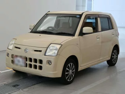 Nissan PINO  с аукциона в Японии