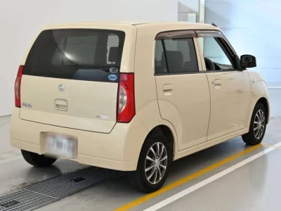 Nissan PINO  с аукциона в Японии