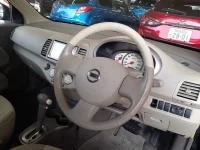 Nissan MARCH лот № 90398 оценка 3.5  с аукциона в Японии 8