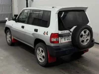 Mitsubishi PAJERO IO лот № 11184 оценка 4  с аукциона в Японии 1
