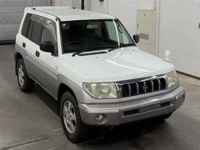 Mitsubishi PAJERO IO  с аукциона в Японии