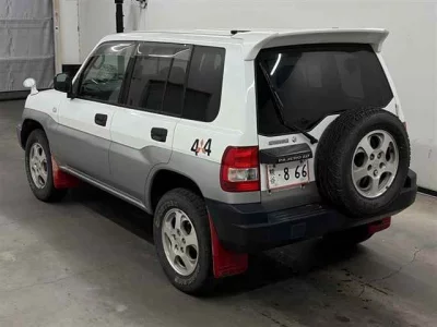 Mitsubishi PAJERO IO  с аукциона в Японии