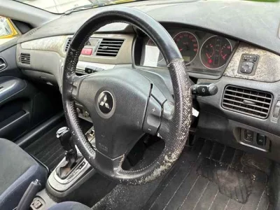 Mitsubishi LANCER  с аукциона в Японии