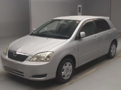 Toyota COROLLA RUNX  с аукциона в Японии