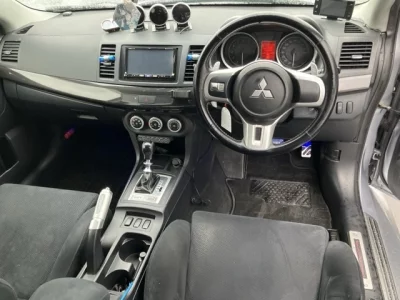 Mitsubishi LANCER  с аукциона в Японии