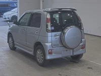 Daihatsu TERIOS KID лот № 1064 оценка 3.5  с аукциона в Японии 1