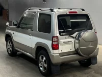 Mitsubishi PAJERO MINI лот № 1032 оценка 3.5  с аукциона в Японии 1