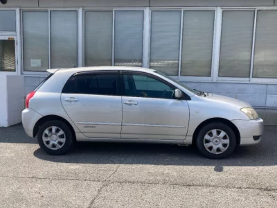 Toyota COROLLA RUNX  с аукциона в Японии