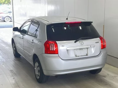 Toyota COROLLA RUNX  с аукциона в Японии