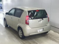 Toyota PASSO лот № 1001 оценка 3.5  с аукциона в Японии 1