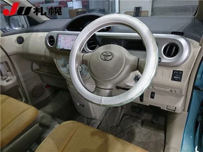 Toyota PORTE  с аукциона в Японии