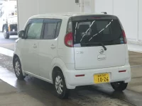 Nissan MOCO лот № 2588 оценка RA  с аукциона в Японии 1