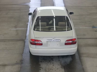Toyota COROLLA  с аукциона в Японии