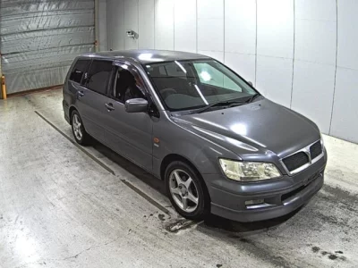 Mitsubishi LANCER  с аукциона в Японии