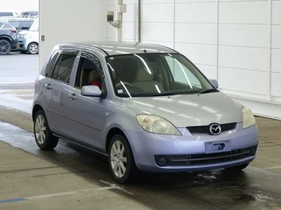 Mazda DEMIO  с аукциона в Японии
