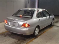 Mitsubishi LANCER лот № 100 оценка R  с аукциона в Японии 4