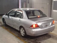 Mitsubishi LANCER лот № 100 оценка R  с аукциона в Японии 1